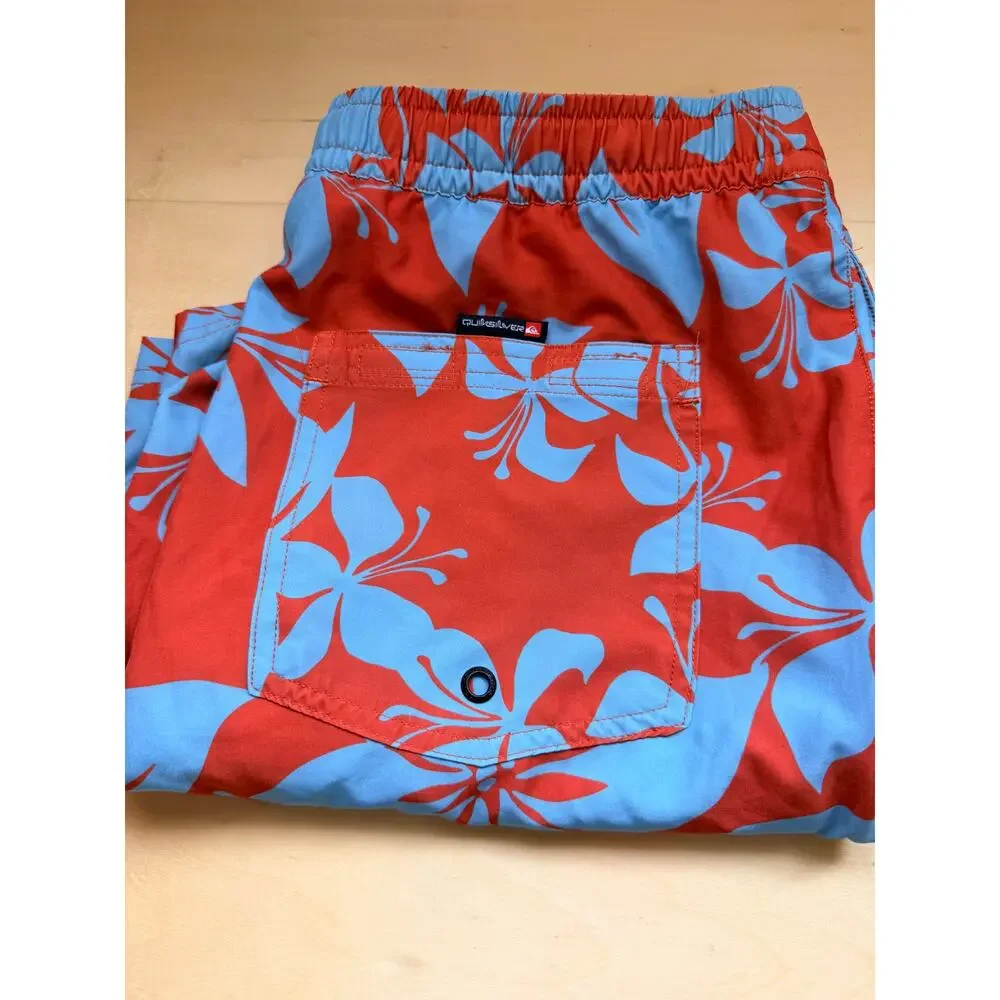 Quiksilver waterman boardshorts blue orange floral size med